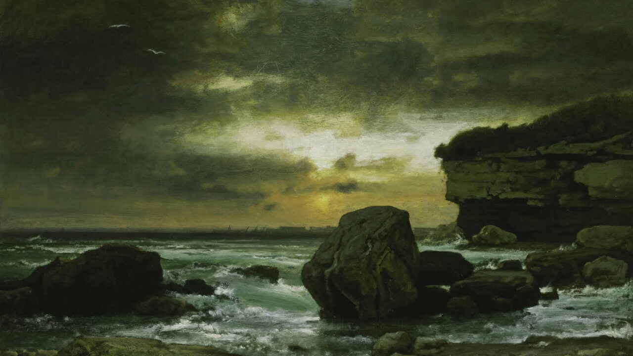 A green storm light over a rocky bay, with a pale break in the clouds.