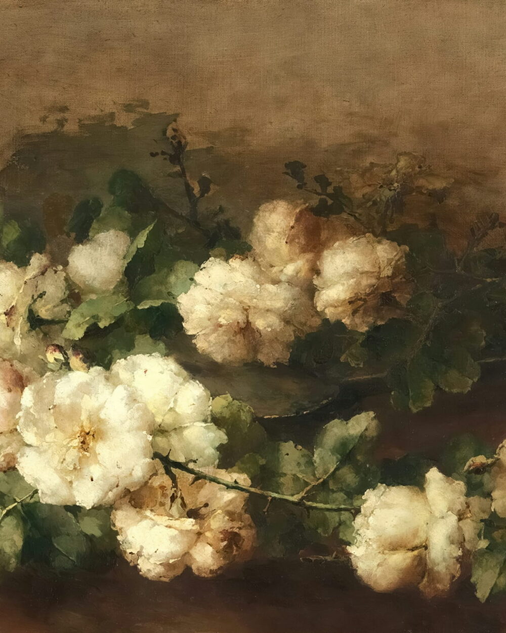 A long spray of white roses and dark leaves on a brown ground.