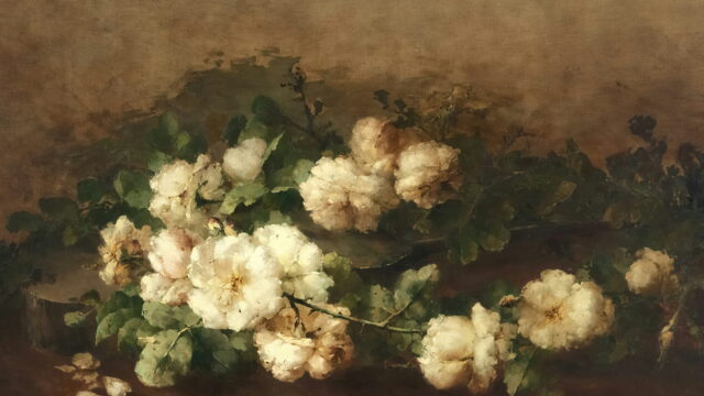 A long spray of white roses and dark leaves on a brown ground.