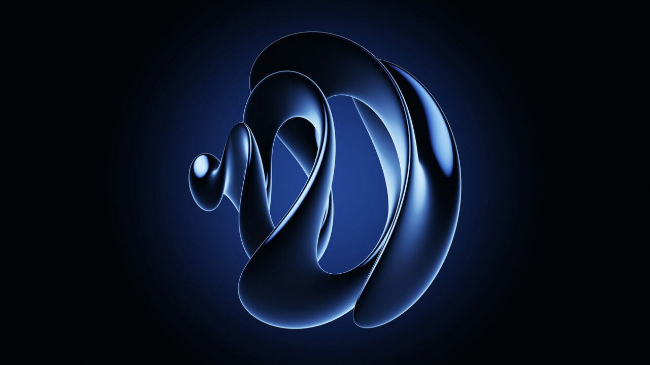 A glossy dark blue knot glowing softly in the dark.