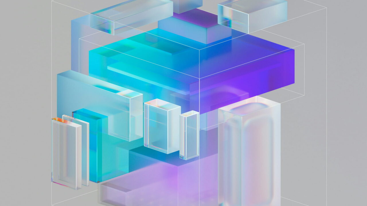 A stack of clear and blue glass blocks inside a thin wire frame.