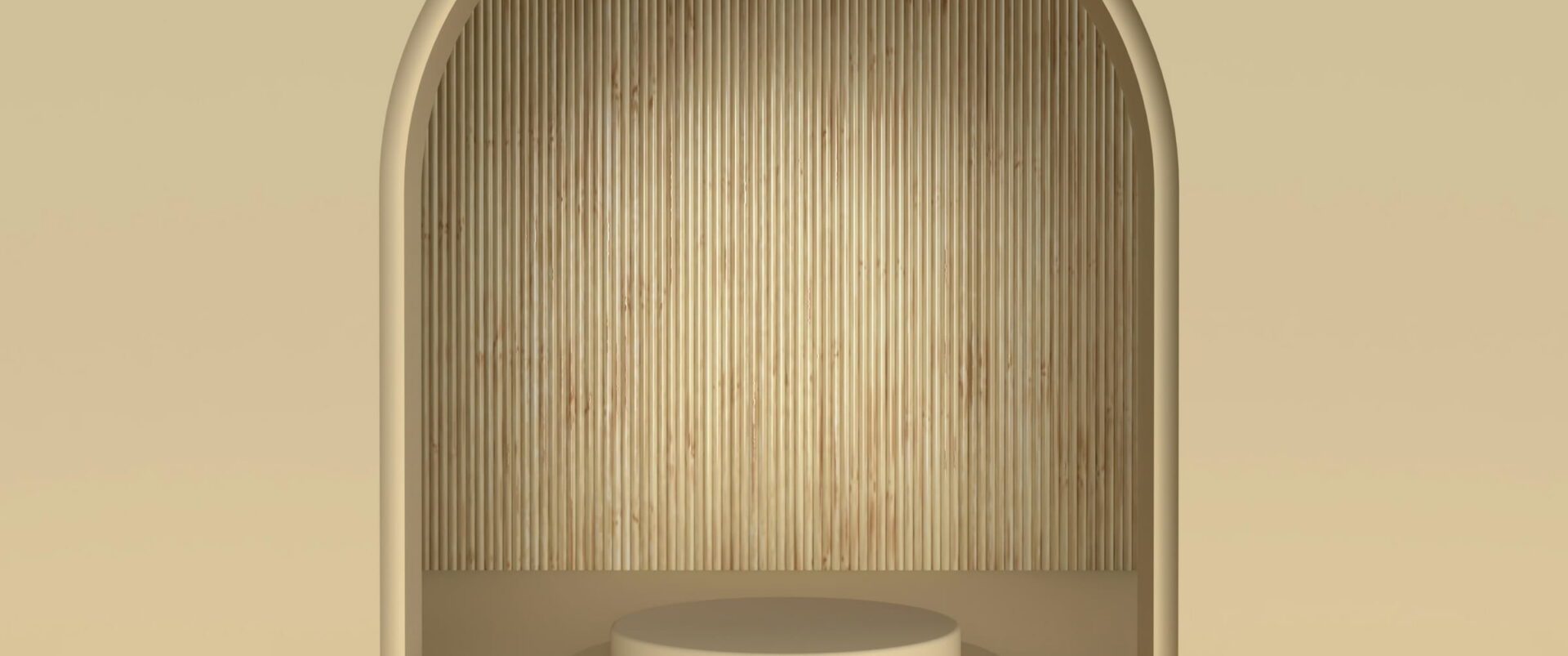 An arched alcove lined with reeds above a round stone step.